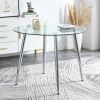 A glass tabletop with a diameter of 40 inches and a modern minimalist circular dining table with electroplated silver metal legs. Suitable for restaur
